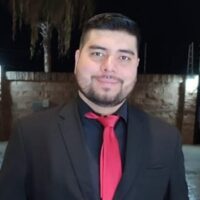 A person is wearing a suit and tie.